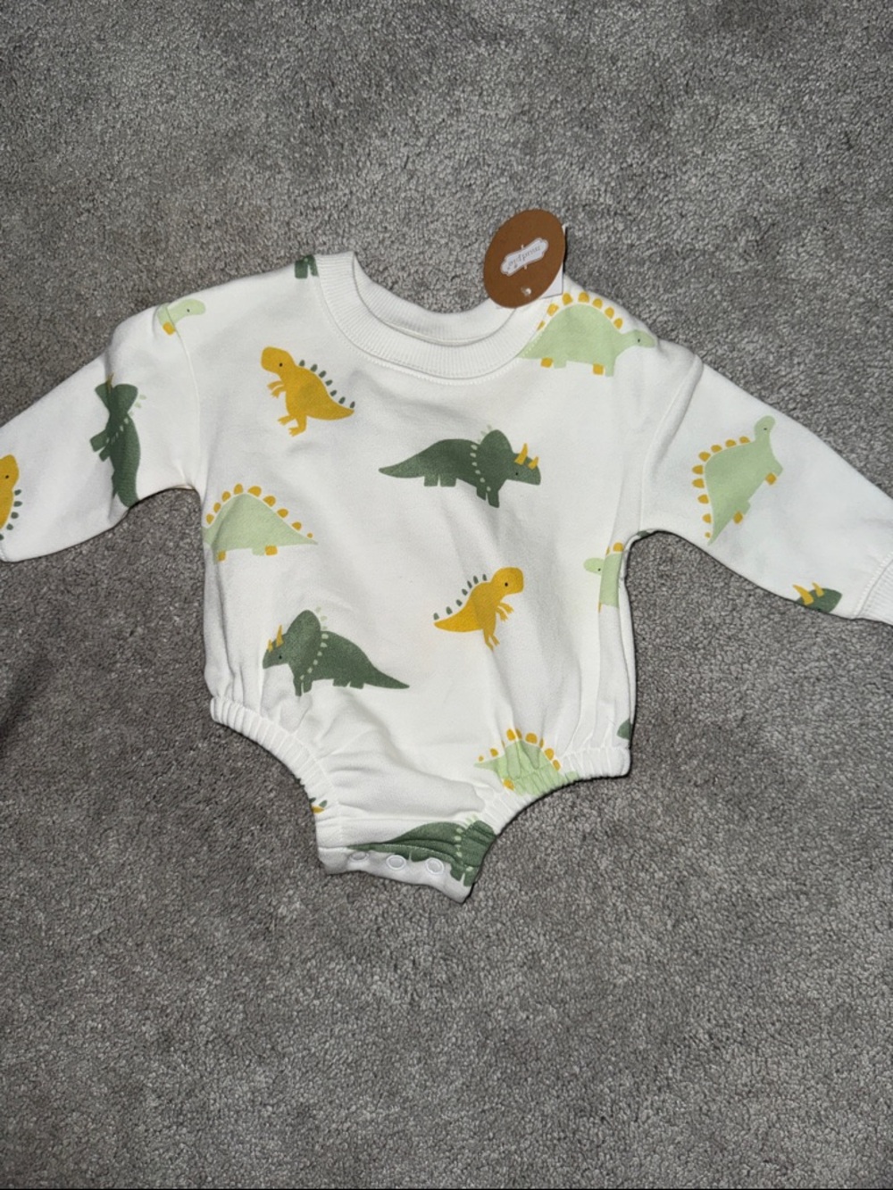 Mud Pie White One-Piece with Green and Yellow Dinosaurs